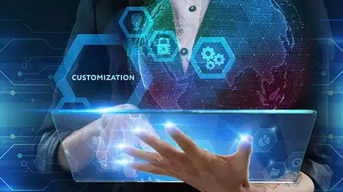 High tech image of a support tech's hands holding a transparent tablet glowing with digital energy.