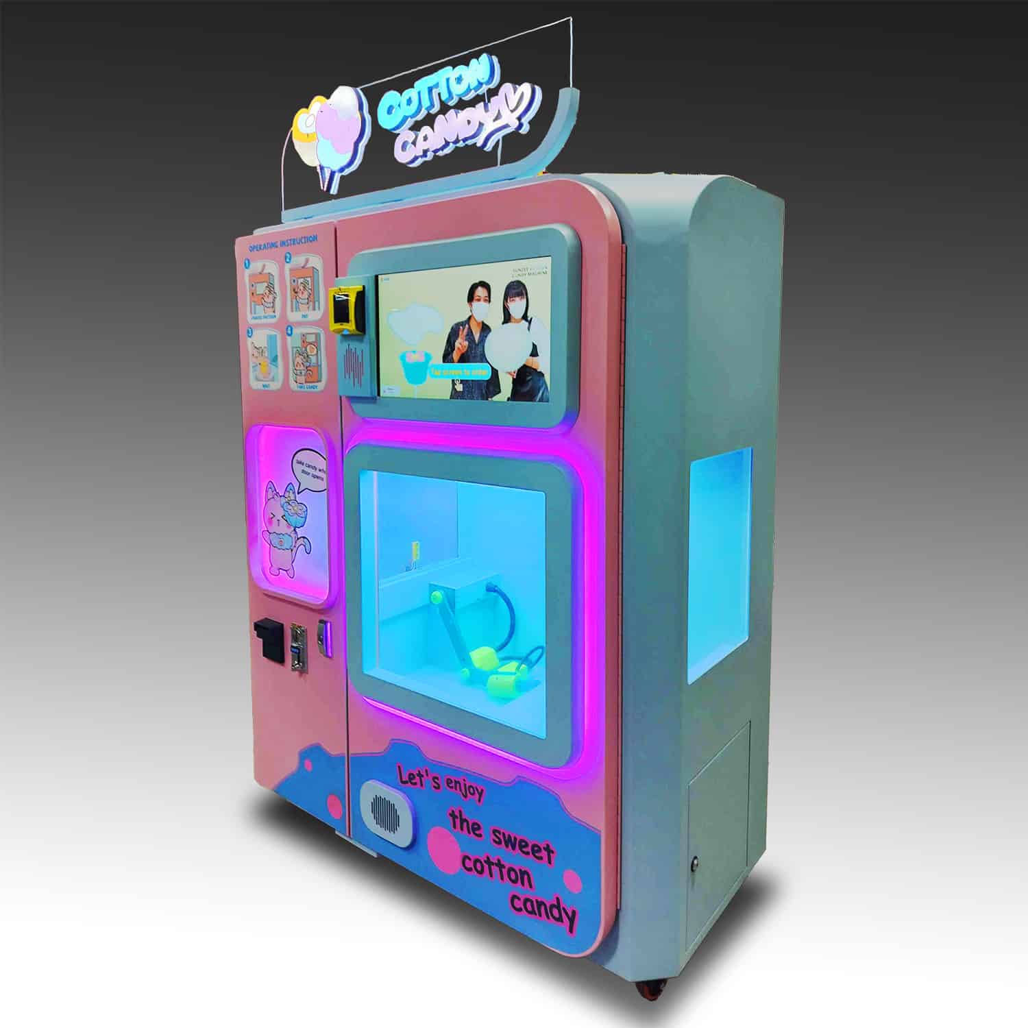 An image of a cotton candy machine with view of the internal cabinet where the candy is made, and a large touchscreen above that